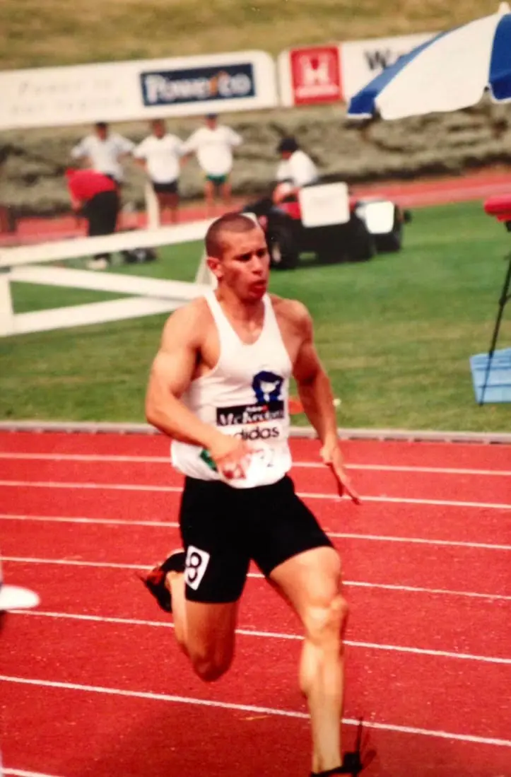 Nathan mid-race on the track during his sprinting career